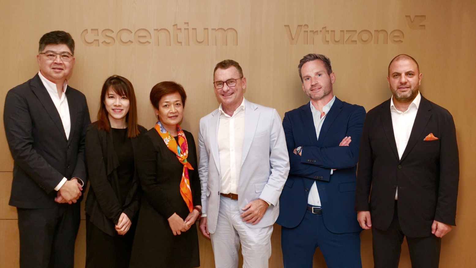 From left to right: Lennard Yong, Founding Management & Group CEO; Chloe Chan, Chief Strategy and Corporate Development Officer; Wendy Wang, Founding Management & Group President from Ascentium, joined by Neil Petch, Chairman and Co-founder; Geoff Rapp, Executive Director and Co-founder; George Hojeige, Group CEO from Virtuzone.
